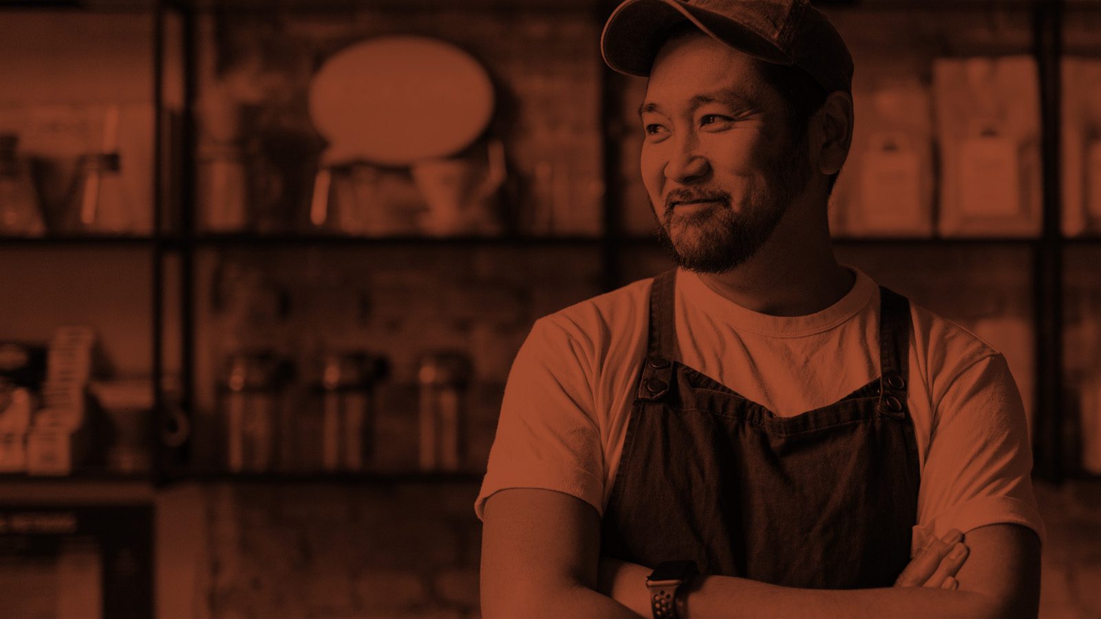 A Local Business Guide to Success with Google Ads Feature Image: Store Owner Smiling