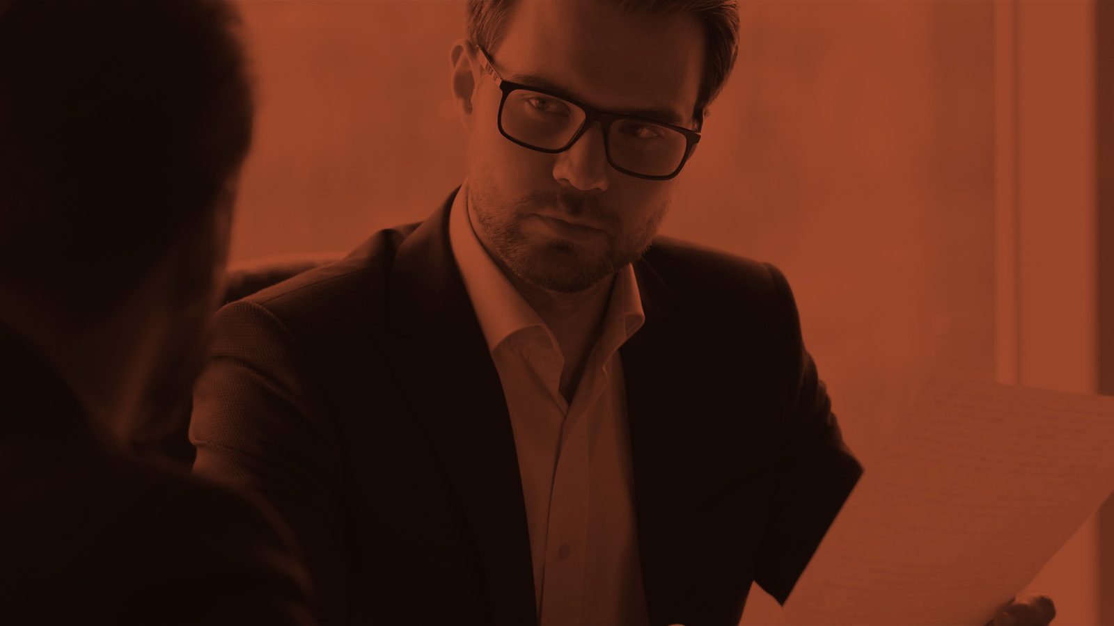 Can SEO Ranking Results Be Guaranteed? Feature Image: A Man With a Look of Distrust on His Face